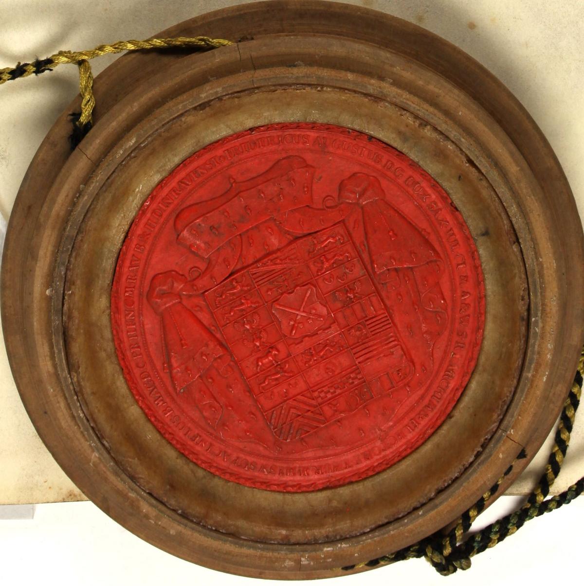 Das Bild zeigt das Siegel vom Kurfürsten Friedrich August III. von Sachsen, welches der Urkunde anhängt.